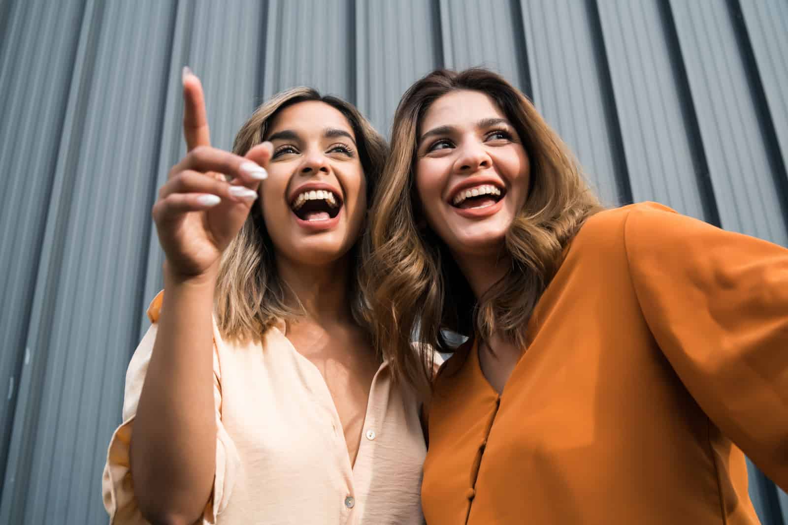 Portrait of two young friends outdoors