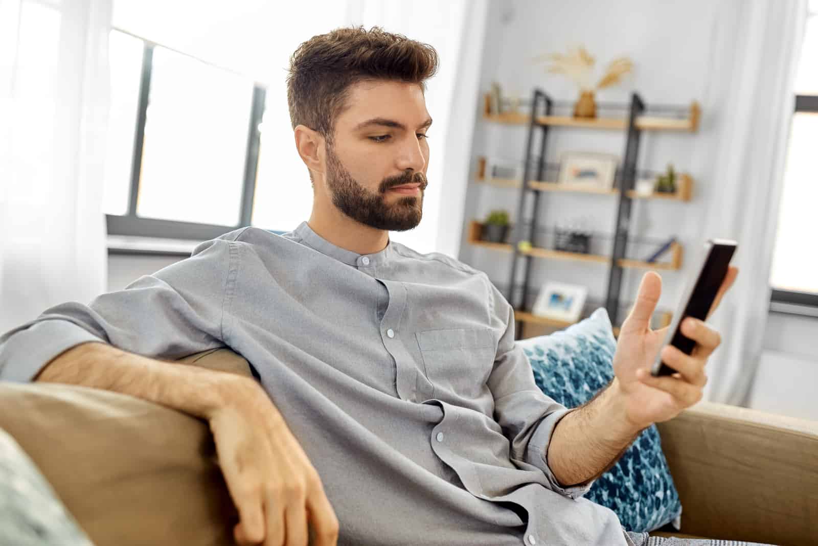 man going through window