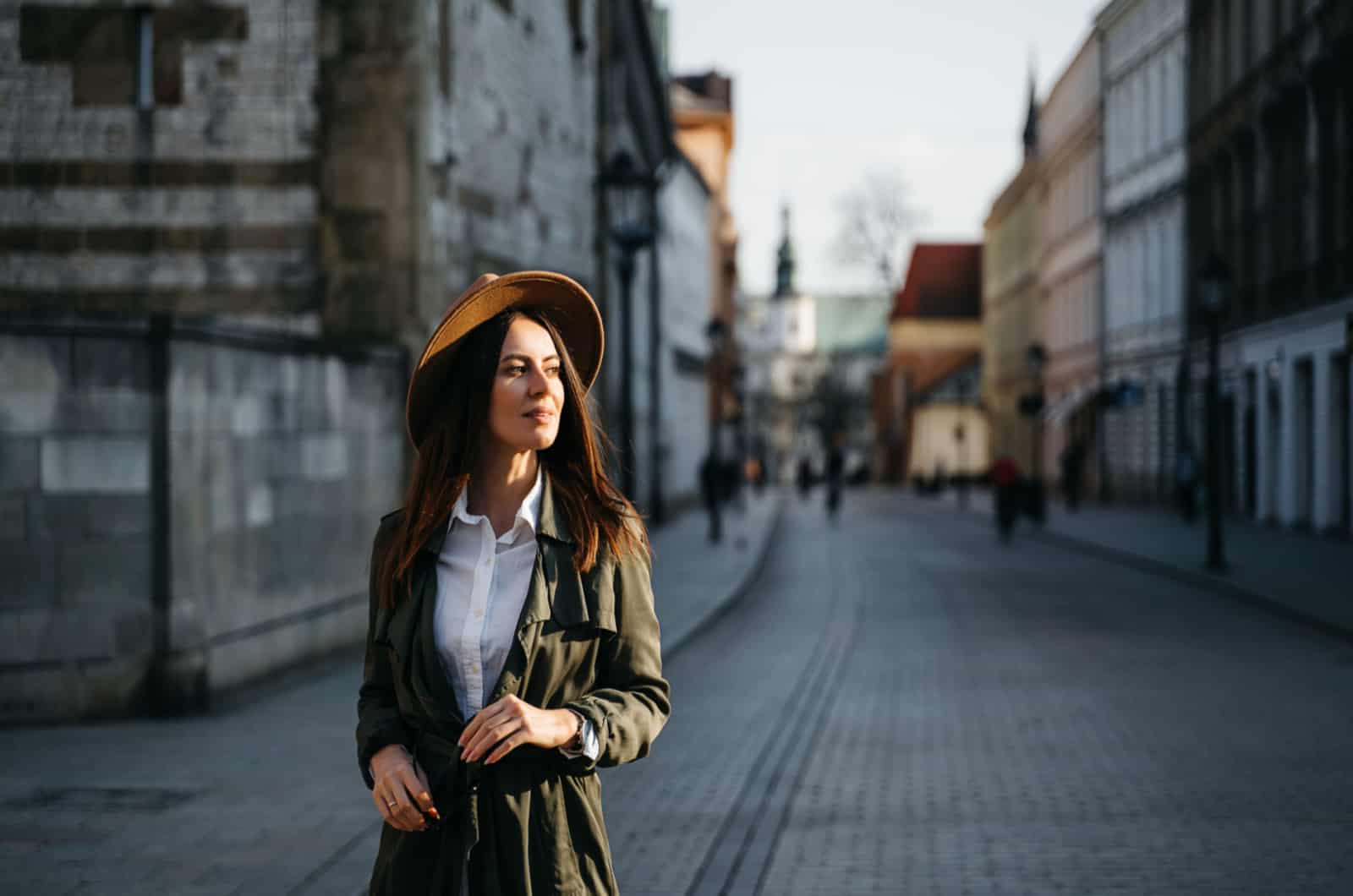 portrait of a woman walking down the street