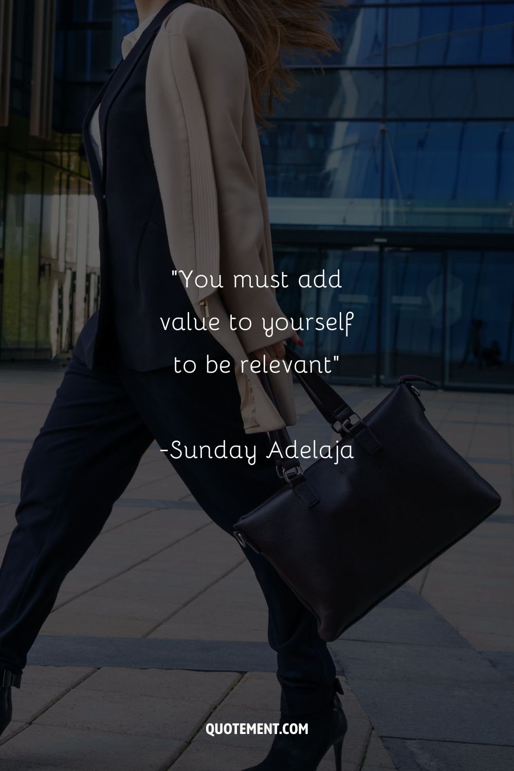 Woman in a stylish suit with a briefcase representing new beginning job quote