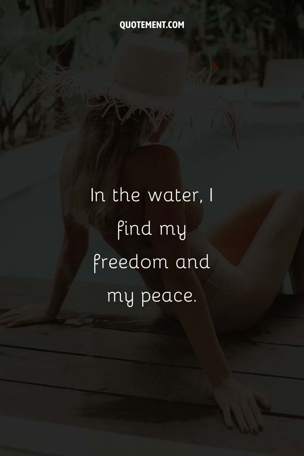 Woman sitting in a bikini representing water caption.
