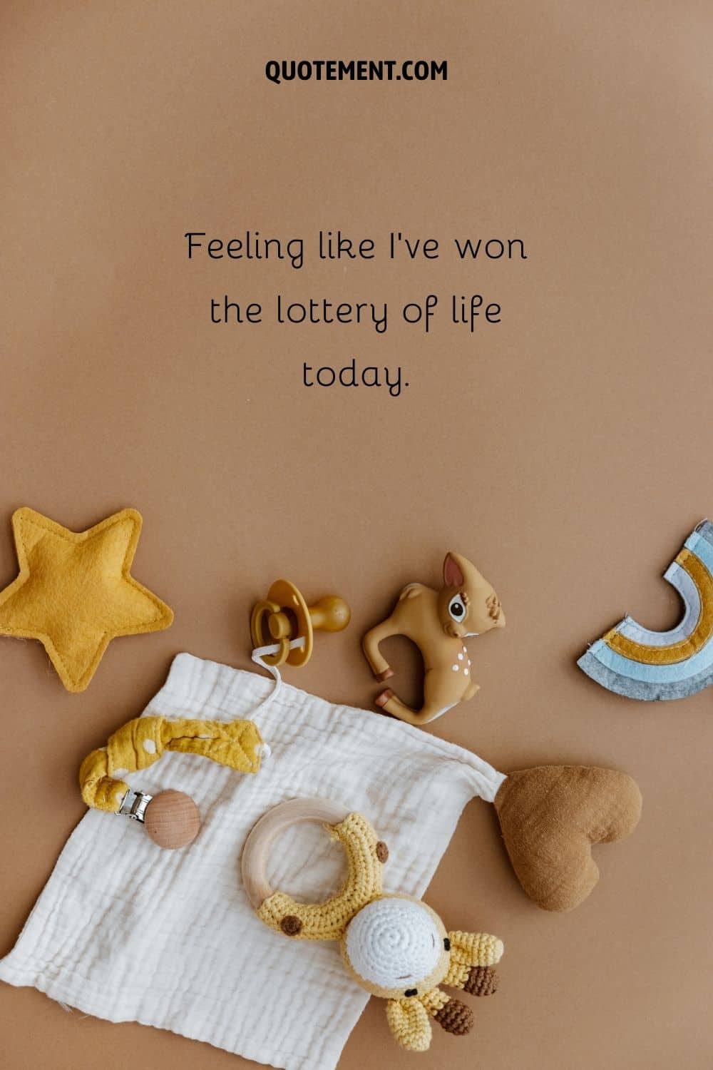 adorable baby toys against an ocher background