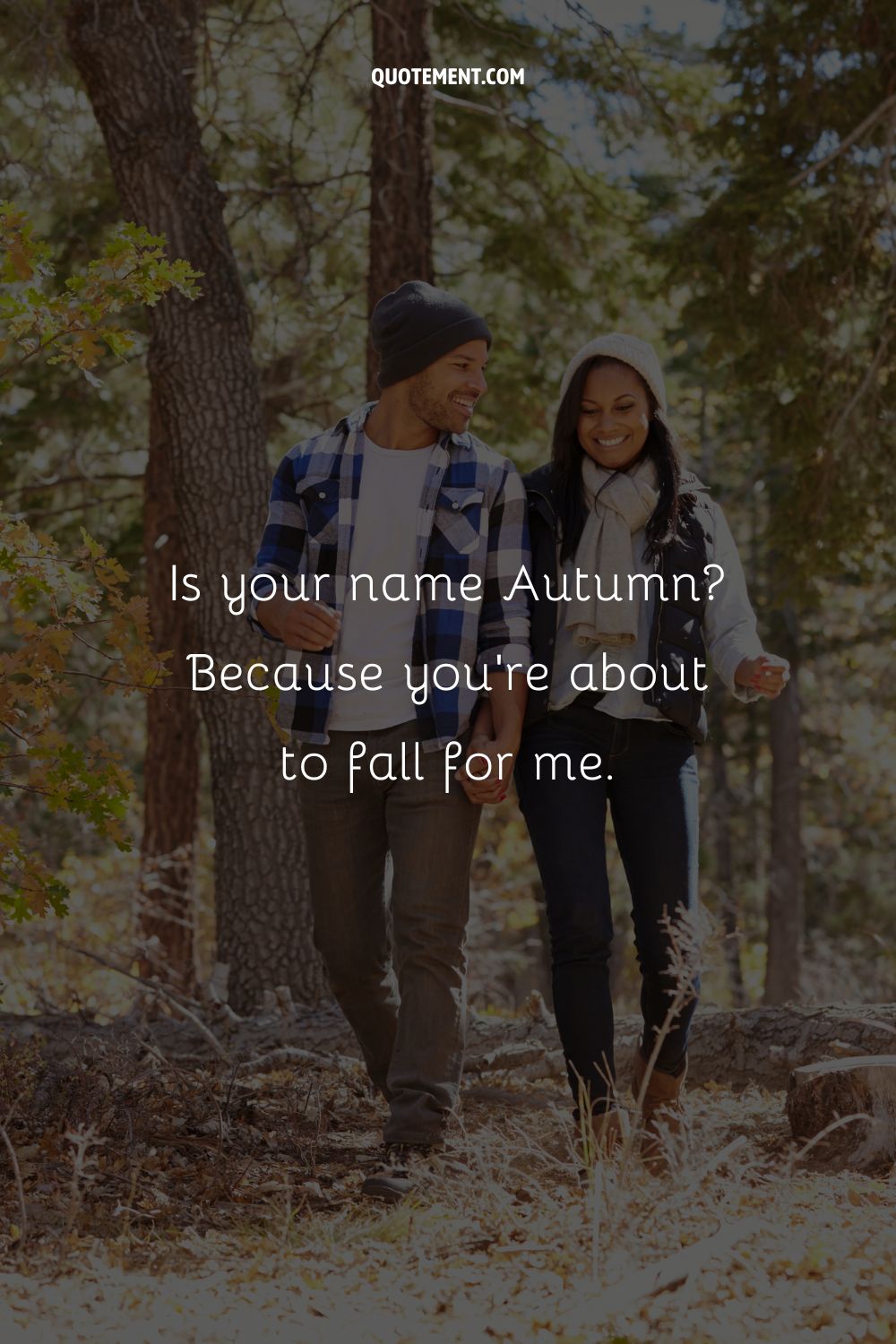 smiling couple enjoying a leaf-strewn walk together