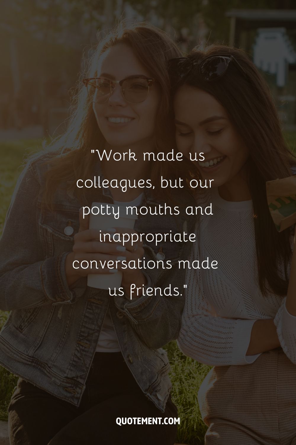 Two smiling women enjoying time together outdoors
